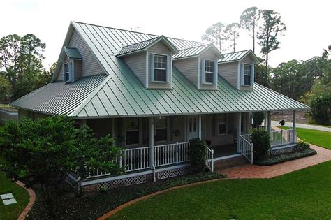 metal roof country houses|are metal roofs sturdy.